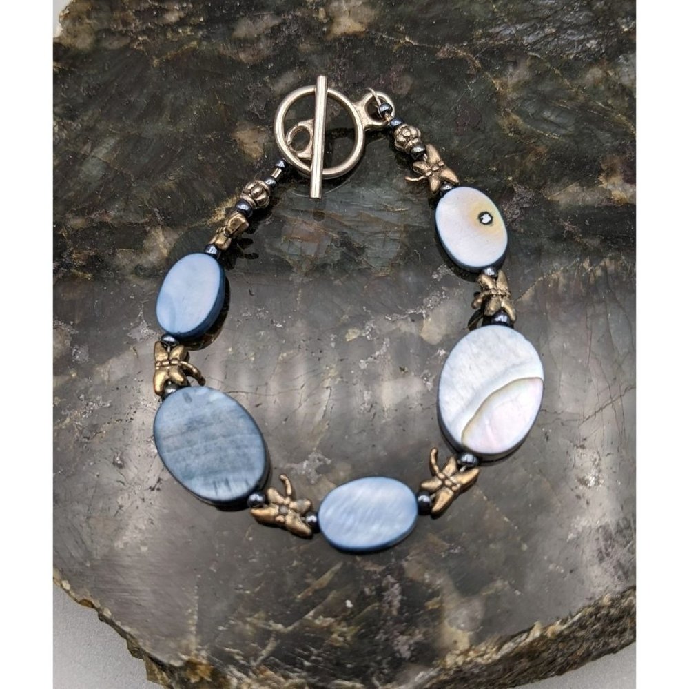Blue Mother of Pearl Disk Bracelet with Dragonfly Spacer Beads Toggle Clasp 7"